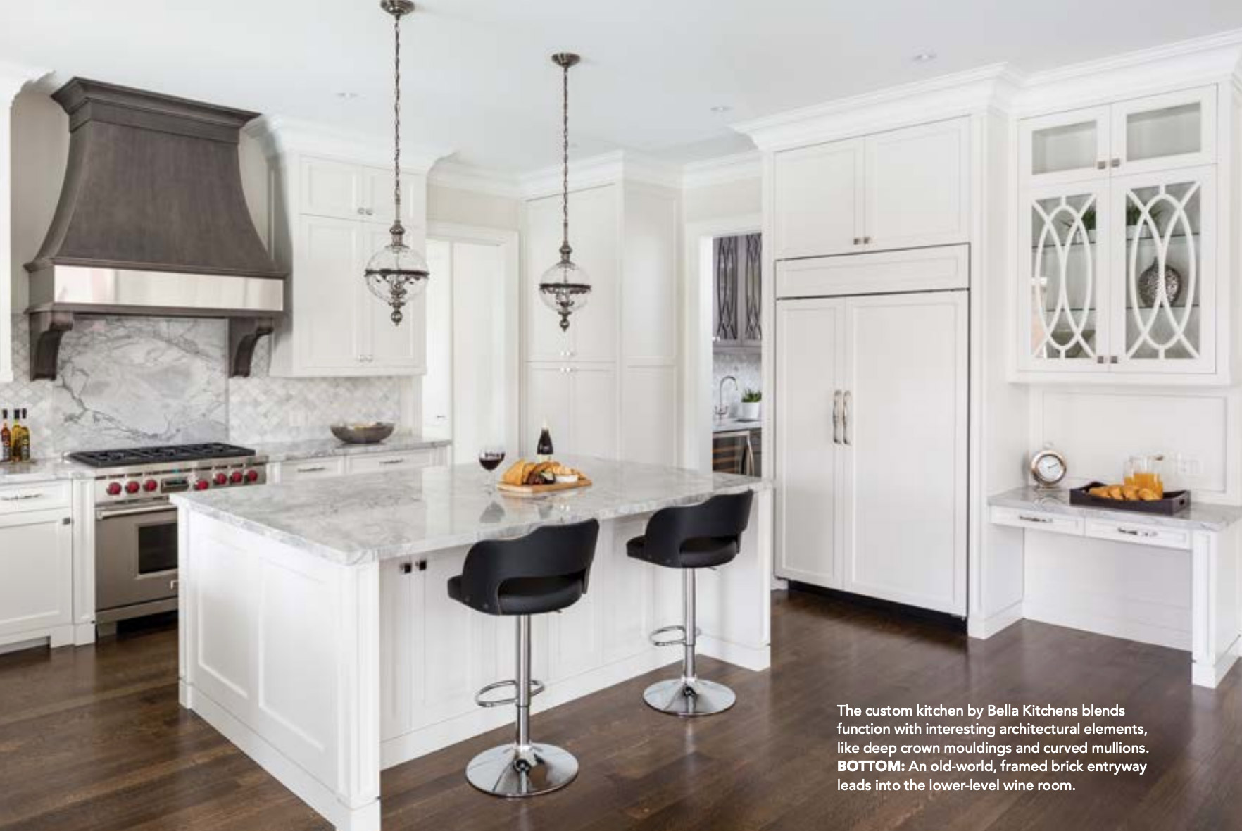 Custom kitchen with granite countertops, white cabinets and hardwood floor.
