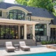 Transitional home with natural stone, wood siding and stone skirt.