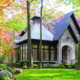 Mississauga house with metal roof, cupola and corner windows.