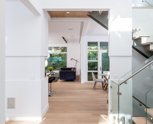 Modern house with floating stair, natural stone and hardwood floor.