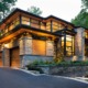 Mississauga modern home with natural stone, metal cladding and flagstone walkway.