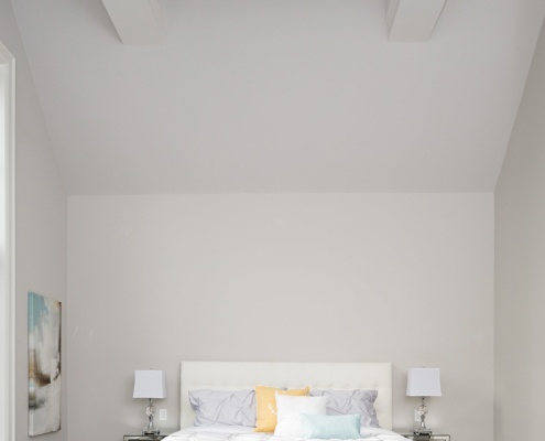 Master bedroom with vaulted ceiling, crown moulding and hard wood floor.