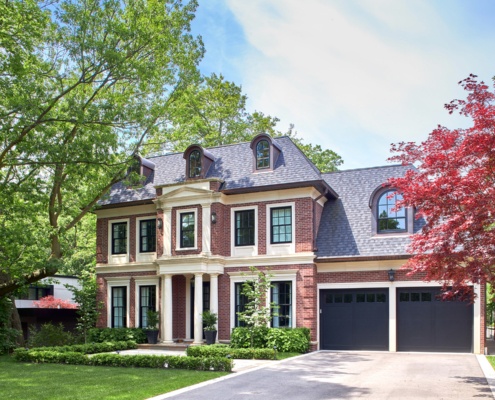 Georgian house with brick, stucco and copper.