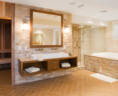 Master bathroom with wood floor, floating vanity and sauna.