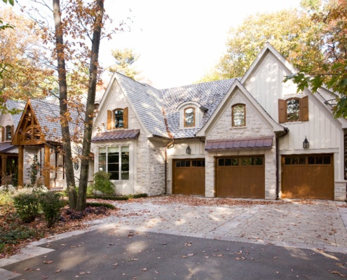 Mississauga house with copper, wood shutters and large gable.