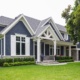 Traditional home with wood siding, natural stone and covered entry.