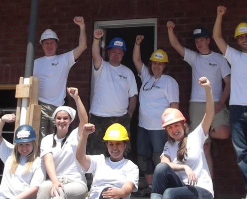 Team members working with habitat for humanity.