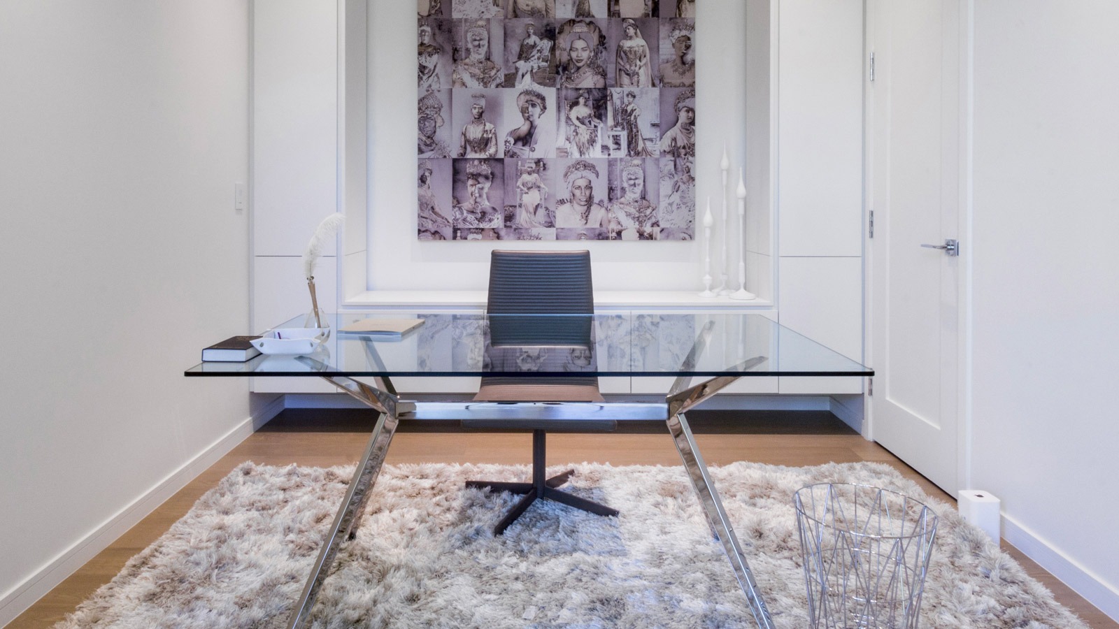 Modern home office with shag carpet, hardwood floor and glass deck.