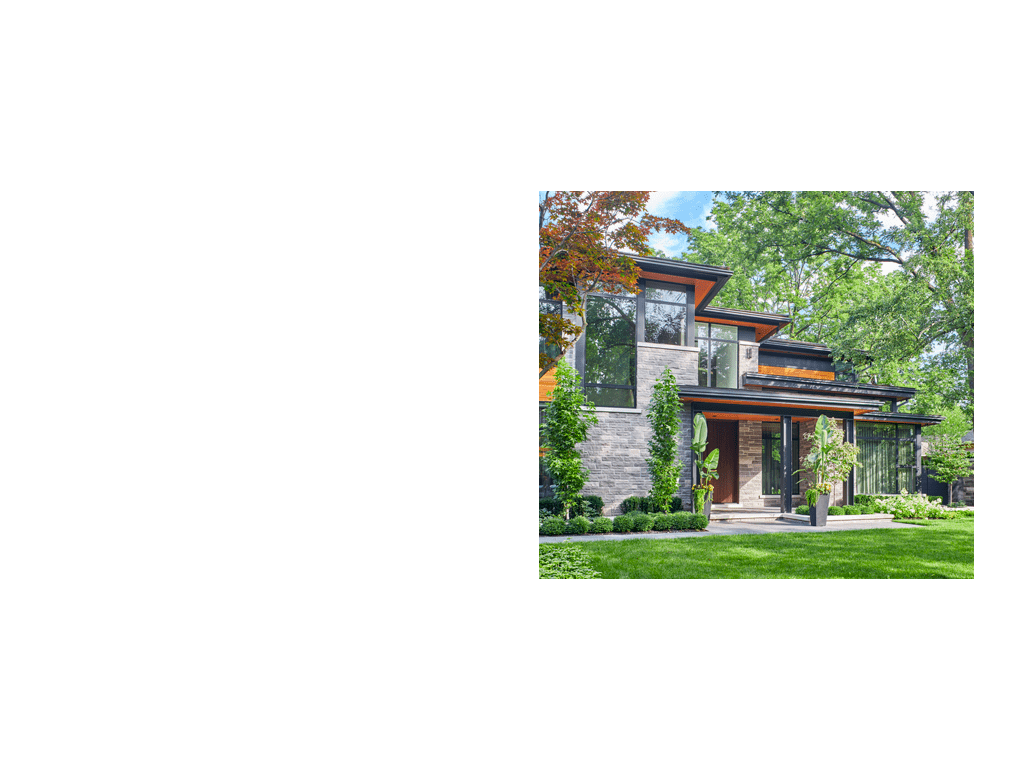 Modern home with steel column, wood soffit and stone siding.