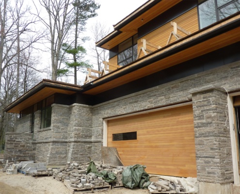Construction of stone wall for Mississauga home.