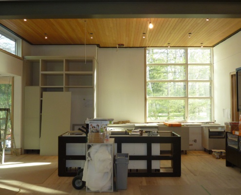 Building new kitchen with island and cabinets.