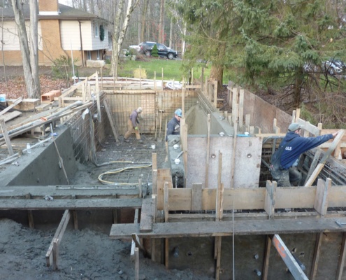 Concrete pouring for hot tub and pool.