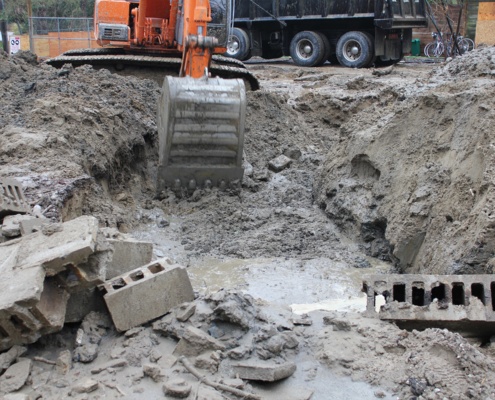 Hole being dug for modern house.