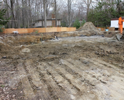 Construction site before excavation with dirt.