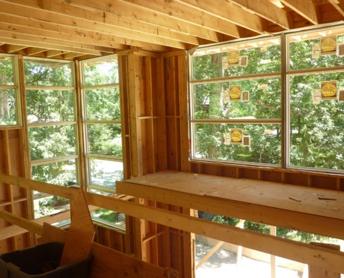 Wood framing and large windows in Mississauga home.